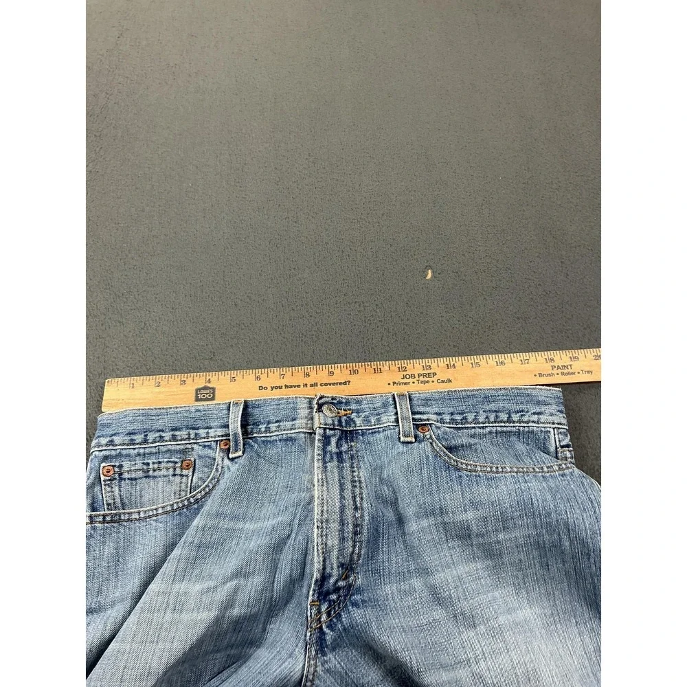 Levi's 527 Jeans Mens 36x32 Light Wash Blue Low Rise Boot Fit Distressed Denim